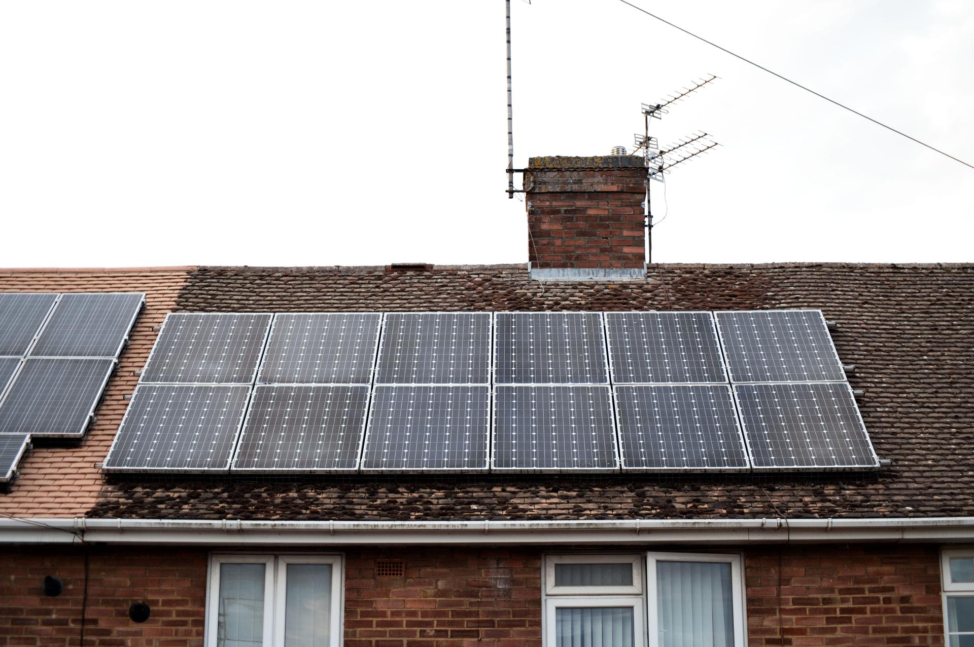 Solar panels on residential house roof.