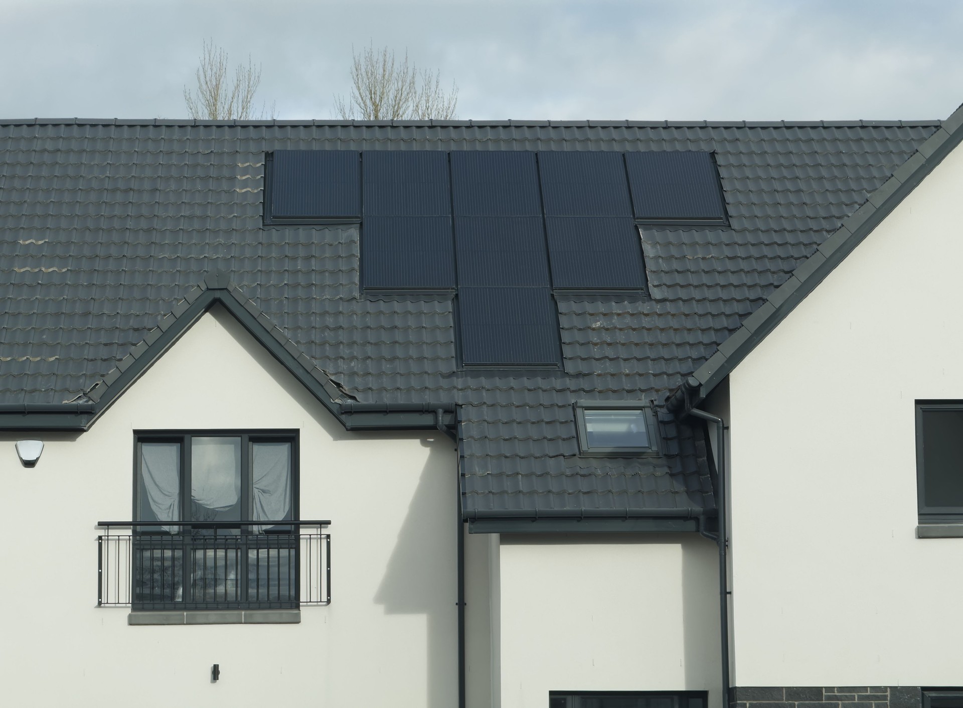 Solar panels installed on home roofs at new housing development